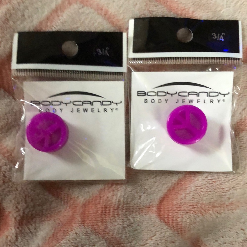 Purple Peace Sign Ear Plugs size 3/4”.